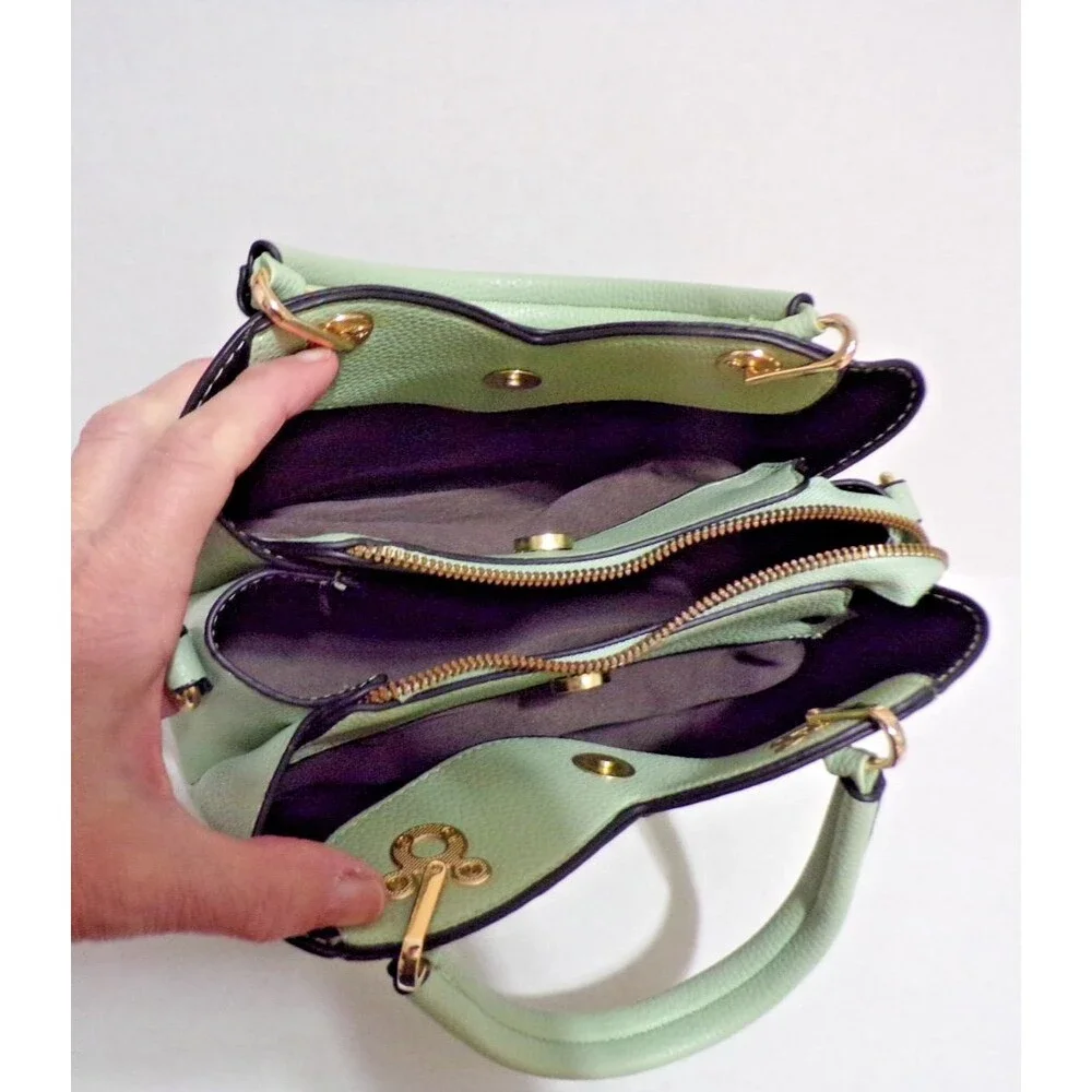 Porrasso Lt Grn Satchel Gold Accents Zippers & Magnets Adjustable Strap Handles